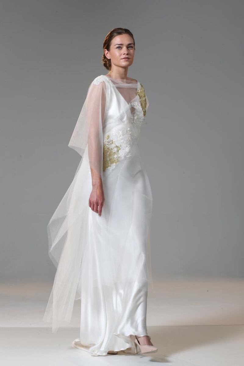 Low-back bias-cut dress in light ivory silk satin (€2,450),  with applique lace tulle tunic (€1,250),  by Delphine Grandjouan
