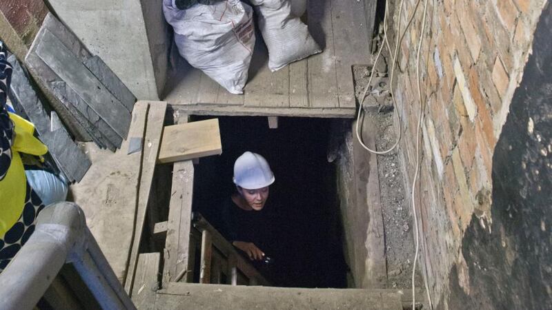 Sunni Goodson,  a conservation specialist with Mesh Architects, in the basement in the hallway of the 17th century house on Aungier Street, Dublin. Photograph: Brenda Fitzsimons