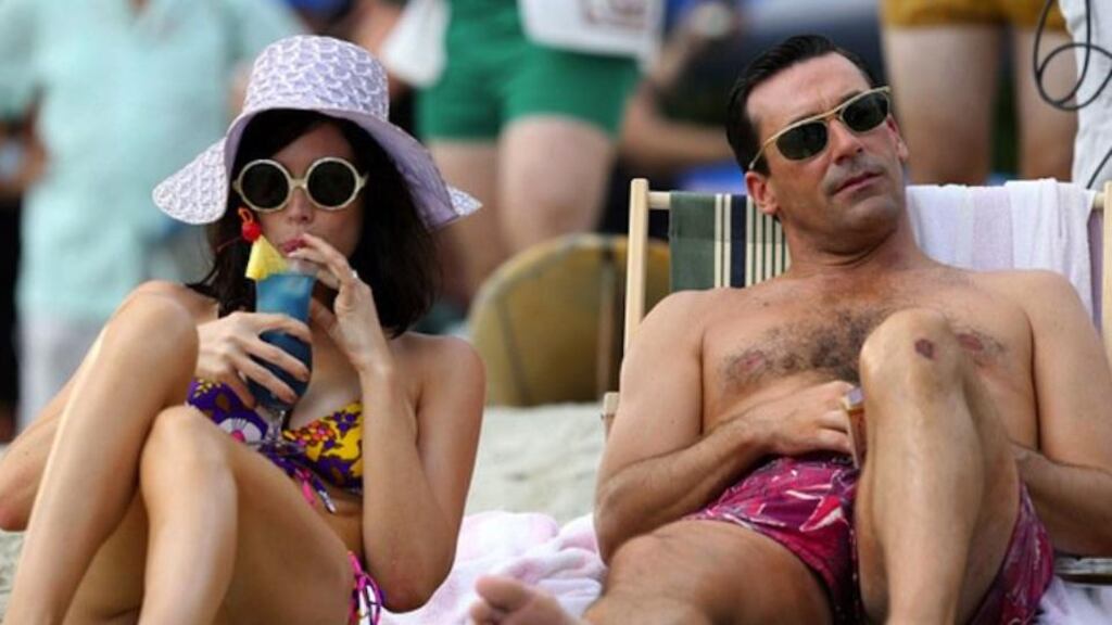 Beach chic: Jessica Paré as Megan Draper, with Jon Hamm as Don Draper, in Mad Men