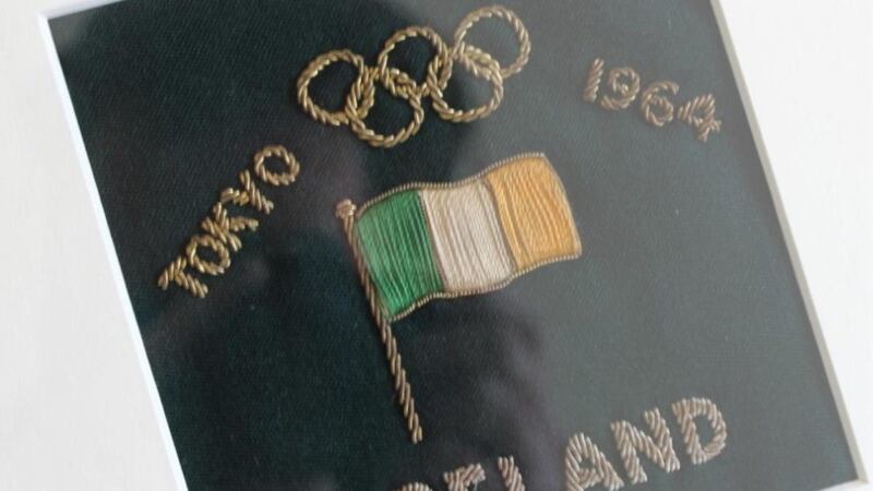 The framed blazer badge from the 1964 Olympics in Tokyo belonging to John Bouchier-Hayes