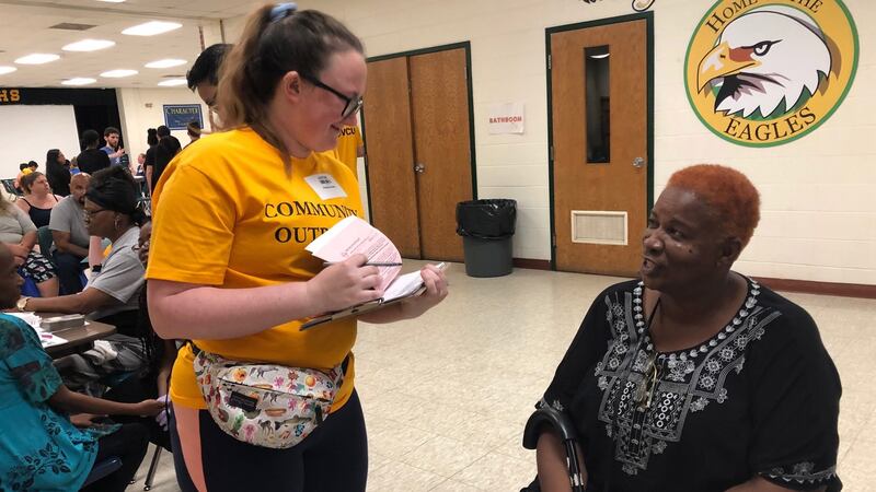 Pharmacy student Justine Field talks to Stephanie Jefferson who is attending the High School clinic. Photograph: Suzanne Lynch