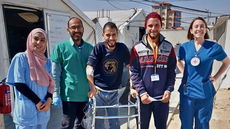 Rieke Hayes (far right) with one of her patients at the Red Cross Field Hospital in Rafah, Gaza. The hospital hasn’t received any new walking aids for patients in more than 18 months. Photograph: Rieke Hayes