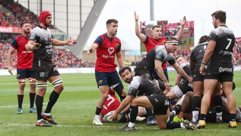Munster’s Conor Murray protests before being awarded a try. Photograph: Niall Carson/PA Wire.
