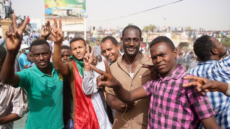 Sudanese protesters celebrate in Khartoum  after Omar al-Bashir was ousted from power on Thursday. Photograph: EPA