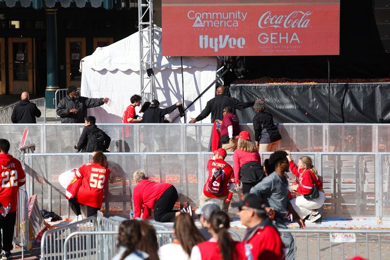 People take cover during shooting. Photograph: Jamie Squire/Getty Images