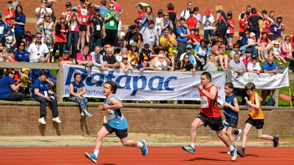 Athletes, from left to right, Harrison Gaw, Blackrock, Dublin, Eastern Region, Ronan Desmond, Bandon, Co Cork, Team Munster, Sean Nolan, Enniscorthy, Co Wexford, Team Leinster, and Patrick Brown, North Down, Team Ulster, during the Division 15 50m run heat. Photograph: Diarmuid Greene/Sportsfile