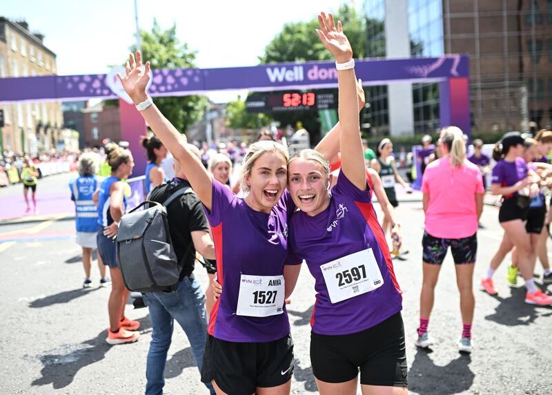 Anna Mulligan (L) and Tara Walshe pose for a photograph after the mini marathon. Photograph: David Fitzgerald/Sportsfile