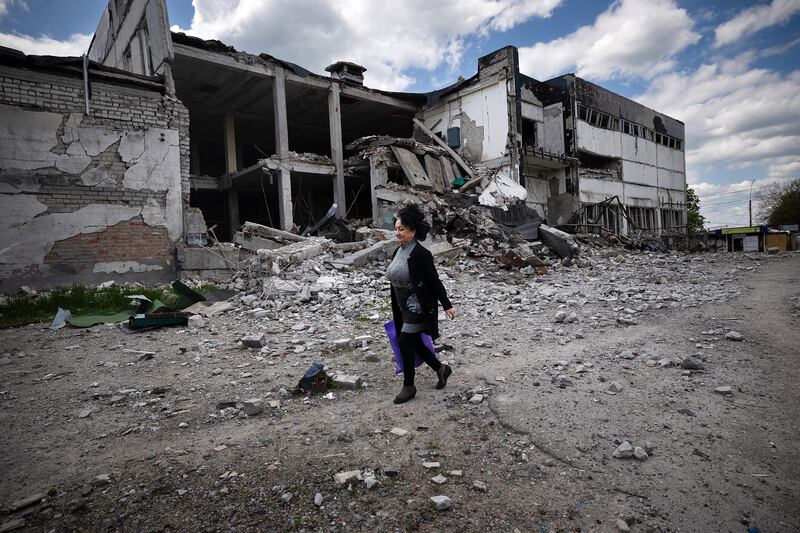 Destroyed buildings in Kupiansk, Ukraine. Photograph: Tyler Hicks/New York Times
                      
