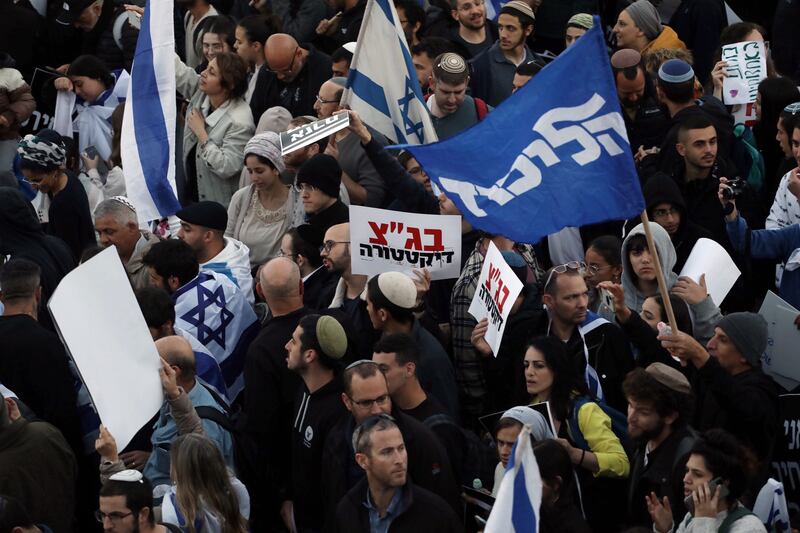 Supporters of  Mr Netanyahu holding a counter-demonstration in Jerusalem.  Photograph: Avishag Shaar-Yashuv/The New York Times
                      