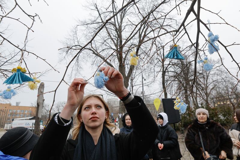 Ukrainians pay tribute to the people killed during anti-government protests on February 20th, 2014 at a memorial for Maidan activists in Kyiv. Photograph: Sergey Dolzhenko/EPA-EFE