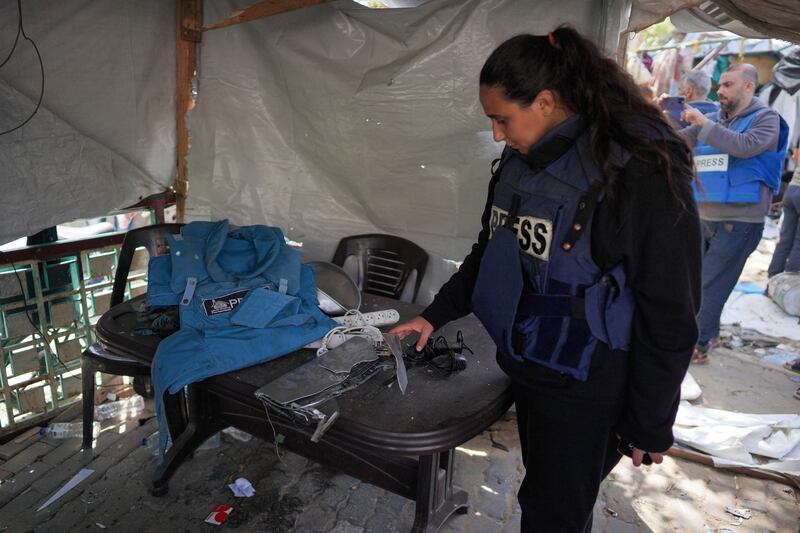 Palestinian journalist Hind Khoudary at a makeshift camp for displaced people in front of the Al-Aqsa Martyrs Hospital after it was hit by an Israel bombardment. Photograph: AFP