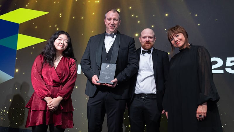 Shiori Kanazawa, awards judge, presents the fit out project of the year - conservation award Millimetre Design team