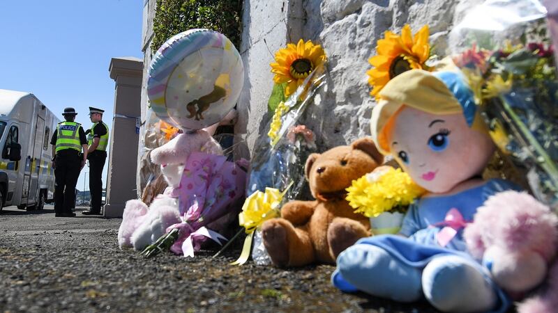 Tributes are left for six-year-old Alesha MacPhail at a house on Ardbeg Road on  the Isle of Bute, Scotland. Police have opened a murder investigation into her death. Photograph: Jeff J Mitchell/Getty Images