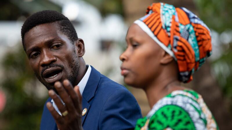 Opposition candidate Bobi Wine addresses the media as security forces surround his home in Kampala on Friday. Photograph: Luke Dray/Getty Images
