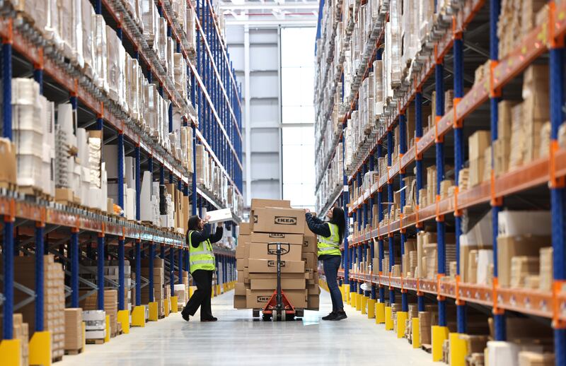 Vanessa Miliaris and Vanessa Ljubetic pick items from the facility's shelfs. Photograph: Dara Mac Dónaill/The Irish Times
