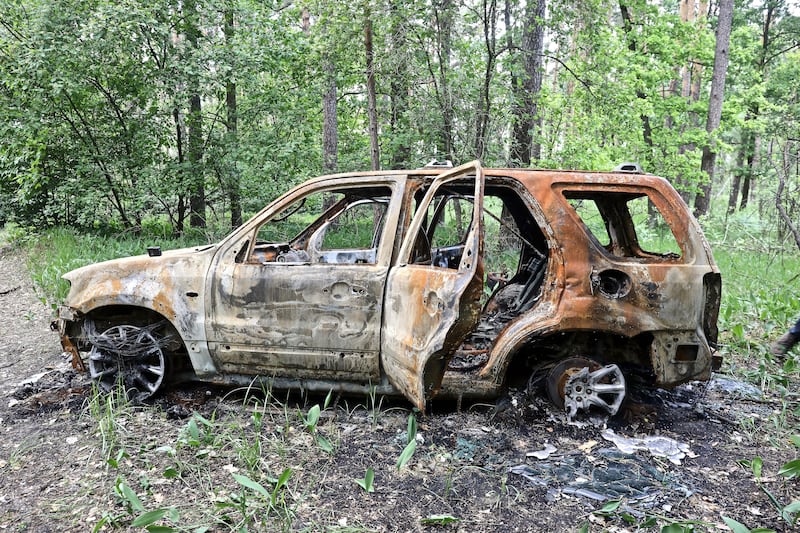 The burnt-out vehicle of Maks Levin, a Ukrainian journalist who was killed in March in a forest north of Kyiv, Ukraine. Photograph: Patrick Chauvel/Reporters Without Borders via the New York Times