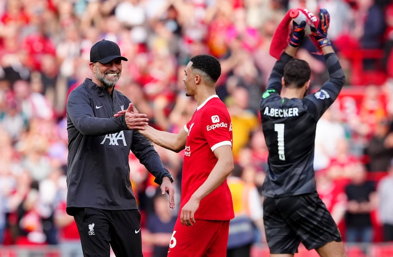Liverpool manager Jürgen Klopp congratulates Liverpool's Trent Alexander-Arnold after the victory over Tottenham. Photograph: Peter Byrne/PA Wire