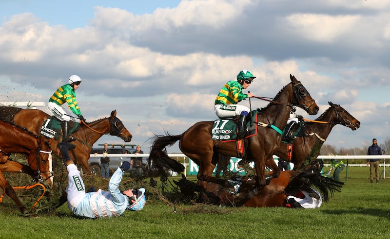 Peter Carberry falls off Gabbys Cross during the 2023 Grand National at Aintree. Photograph: Michael Steele/Getty