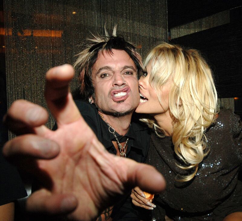 Pamela Anderson with Tommy Lee, her first husband, in 2007. Photograph: Denise Truscello/WireImage/Getty