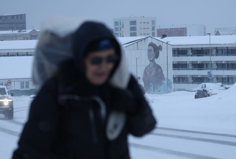 A mural showing an Inuit woman adorns a residential apartment building in Nuuk, Greenland. Photograph: Sean Gallup/Getty Images