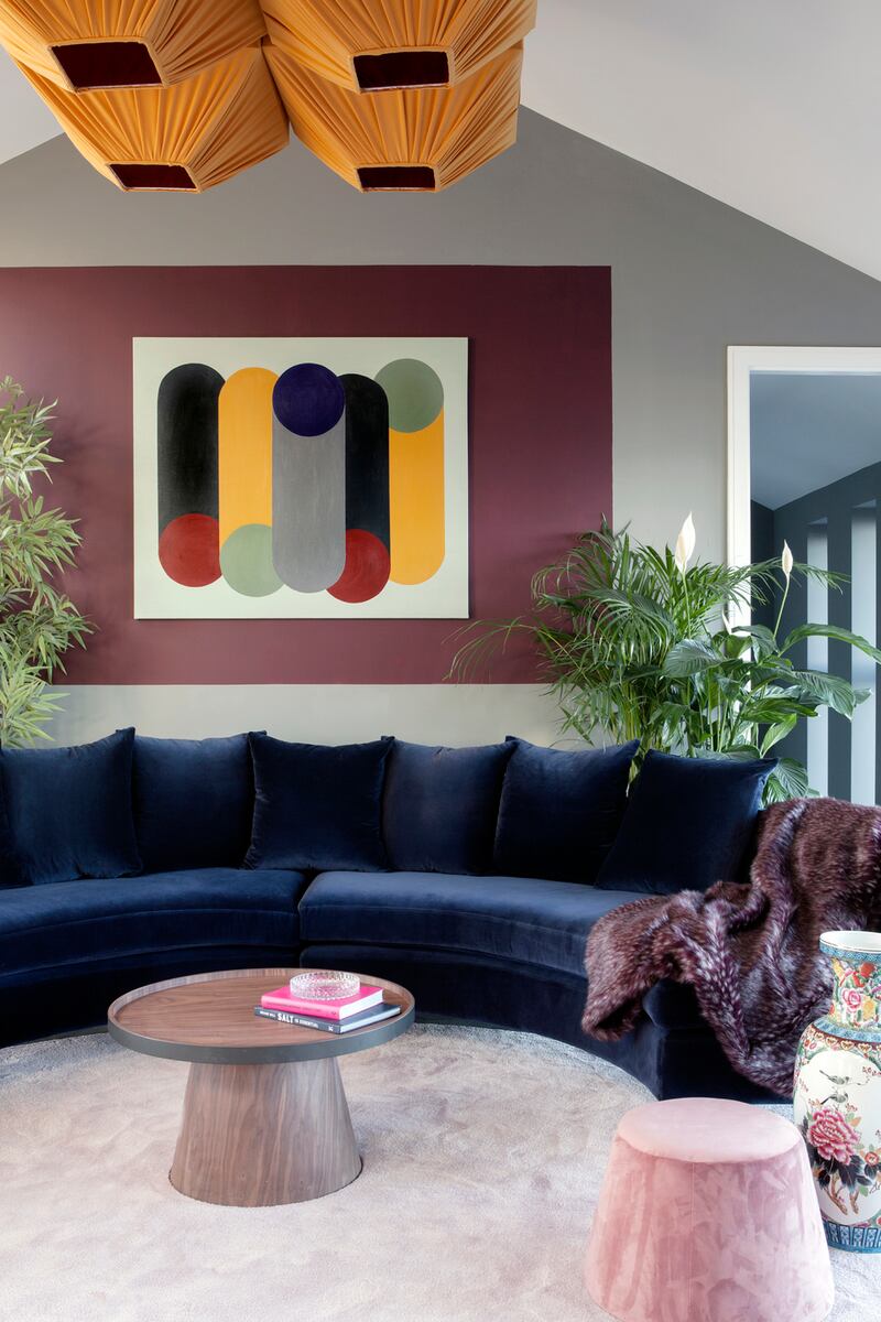 A custom curved sofa by Kingston Lafferty Design in Malahide