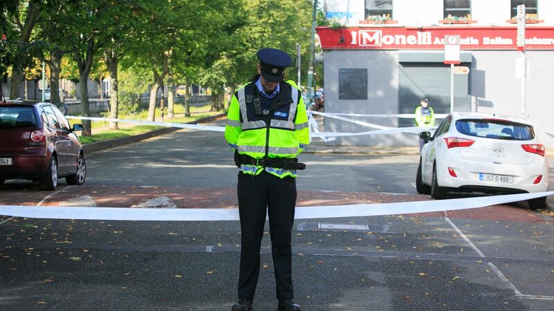 A garda at the scene where a man was shot in the shoulder during a struggle with an off-duty garda in Portobello, Dublin. Photograph: Gareth Chaney/Collins