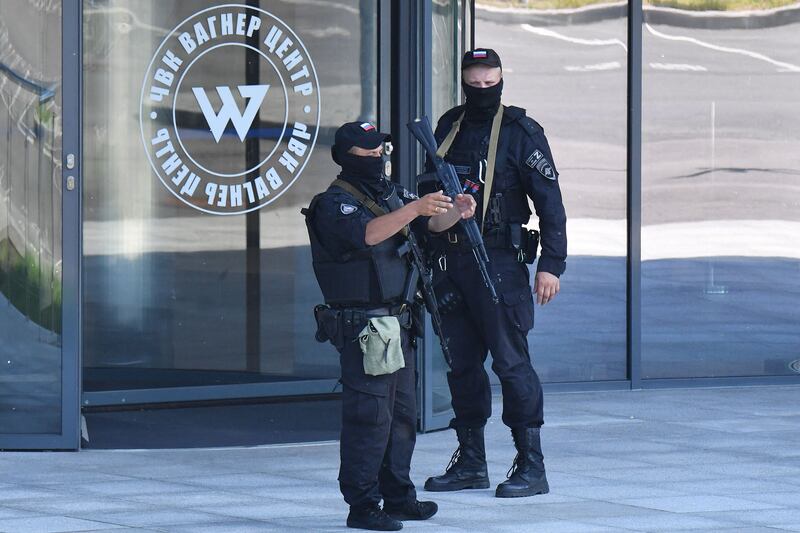 Russian police officers on patrol outside PMC Wagner Centre in St Petersburg on June 24th, 2023. Photograph: OLGA MALTSEVA/AFP via Getty Images