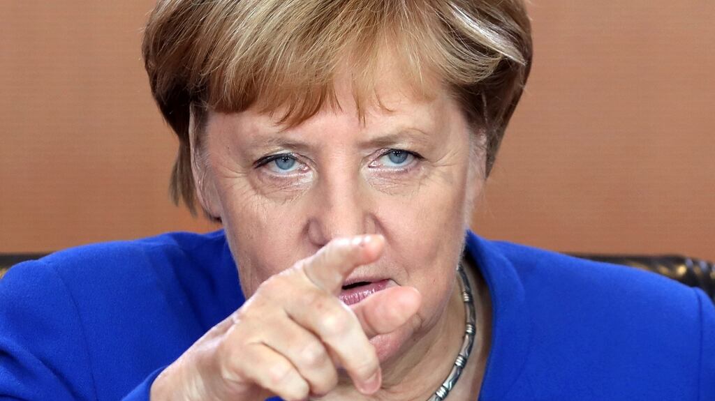 German Chancellor Angela Merkel: ‘Don’t despise compromise. Compromise is what keeps society together.’  Photograph: Felipe Trueba/EPA