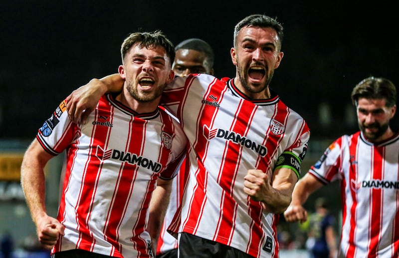 Derry's Adam O'Reilly celebrates his goal with Michael Duffy. Photograph: Lorcan Doherty/Inpho
