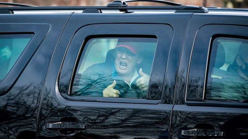 Donald Trump gives a thumbs up towards supporters as he departs Trump National Golf Club on December 13th, 2020, in Sterling, Virginia. Photograph: Getty Images