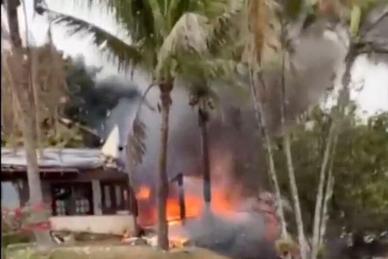 Fire coming from a plane that crashed by a home in Vinhedo, São Paulo state, Brazil. Photograph: Felipe Magalhaes Filho via AP