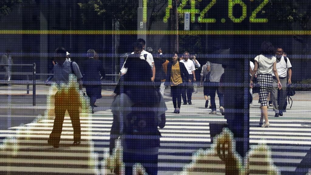 An electronic stock board. Photograph: Kiyoshi Ota/Bloomberg