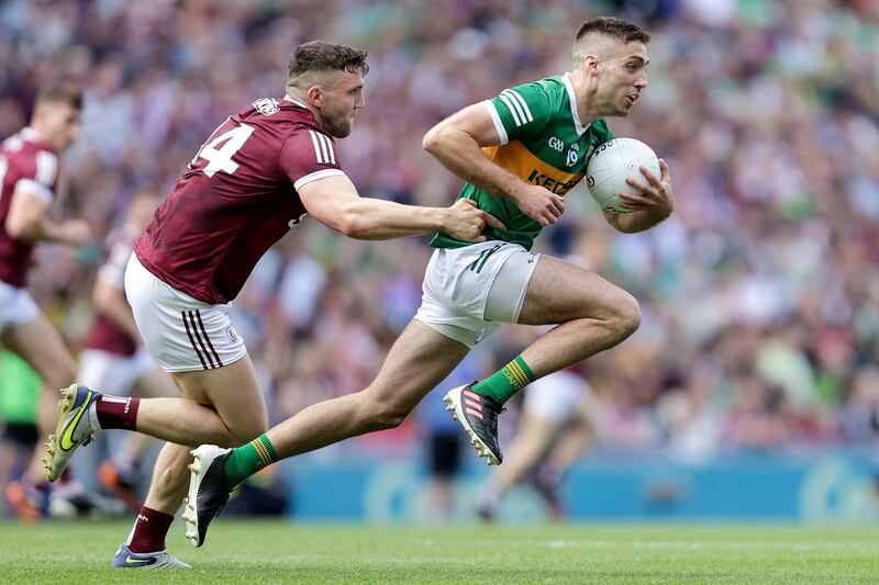 Kerry's Adrian Spillane and Damien Comer of Galway: the introduction of Adrian Spillane and his brother Killian gave Kerry fresh energy around the park and scoring power as Killian landed two vital points. Photograph: Laszlo Geczo/Inpho
