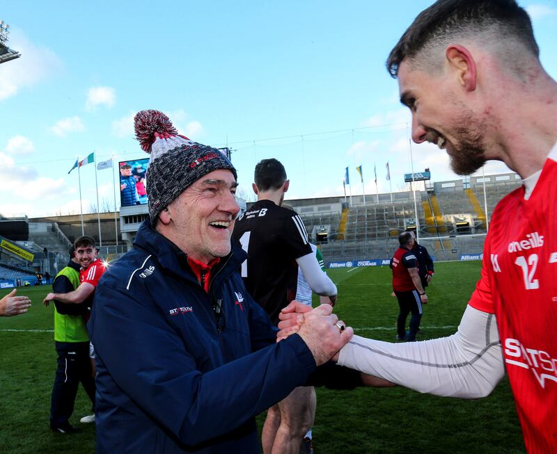 Louth manager Mickey Harte celebrates with Ciarán Downey after the Division Three Final against Limerick at Croke Park in April 2022. Photograph: Lorraine O'Sullivan/Inpho

