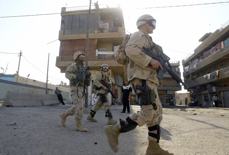US soldiers on patrol in Baghdad, Iraq in 2004. Photograph: Amhad Al-Rubaye/AFP via Getty Images