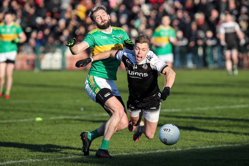 AIB GAA Ulster Senior Football Championship Final, Athletic Grounds, Armagh 11/12/2022
Glen vs Kilcoo
Glens Ryan Dougan with Jerome Johnston of Kilcoo
Mandatory Credit ©INPHO/Declan Roughan