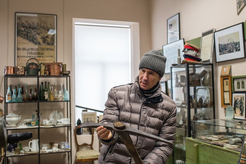 Oleg Vinogradov, an amateur historian, in his private museum that displays Soviet-era memorabilia, in Daugavpils, Latvia, on December 7th. The Latvian government, worried that Russian President Vladimir Putin might seek to 'protect' Russian-speakers in the small Baltic country as he has done in Ukraine, is targeting Russian passport holding residents with legislative measures that are whipping up fear and suspicion. Photograph: Katrina Kepule/The New York Times