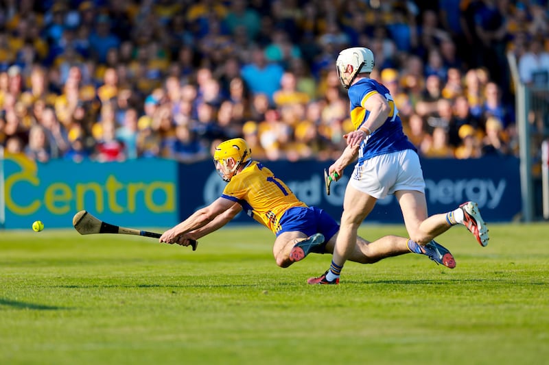 Mark Rodgers of Clare scores a goal against Tipperary in Ennis. Photograph: Natasha Barton/Inpho