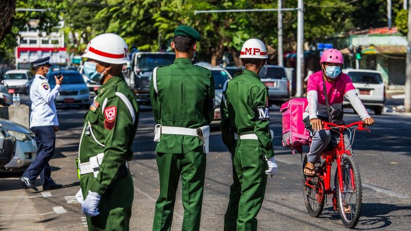 Soldiers stationed at an intersection in Yangon, Myanmar, on Tuesday. Photograph: The New York Times