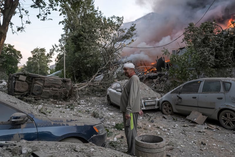 An injured man at the site of a Russian strike on a residential area in Kyiv. Photograph: Maxym Marusenko/EPA
