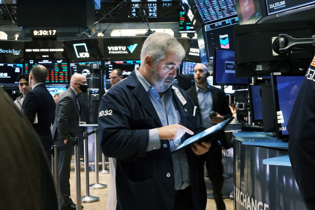 Traders working on the floor of the New York Stock Exchange. Photograph: Spencer Platt/Getty Images