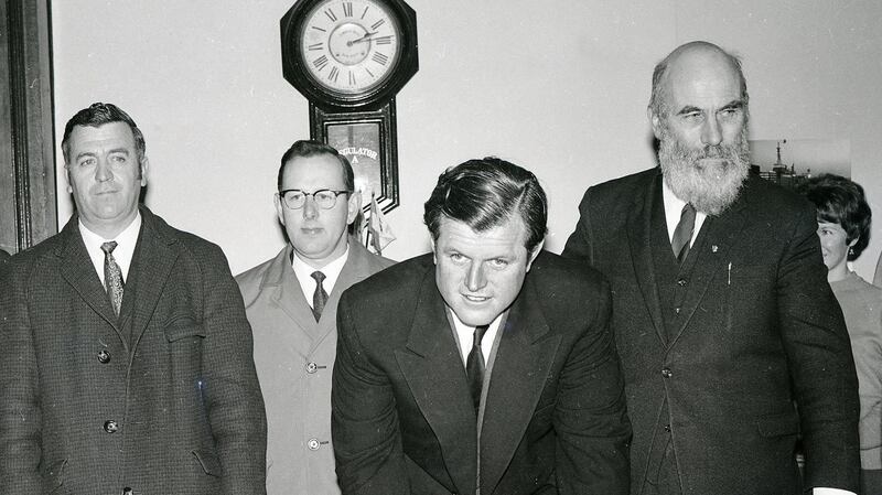 Senator Ted Kennedy  signs the visitors’ book at New Ross Town Council in New Ross ,Co. Wexford in 1970 with (right) the then chairman Andy Minihan and Cllrs Paddy Doyle and Russel Jacob. Photograph: PJ Browne