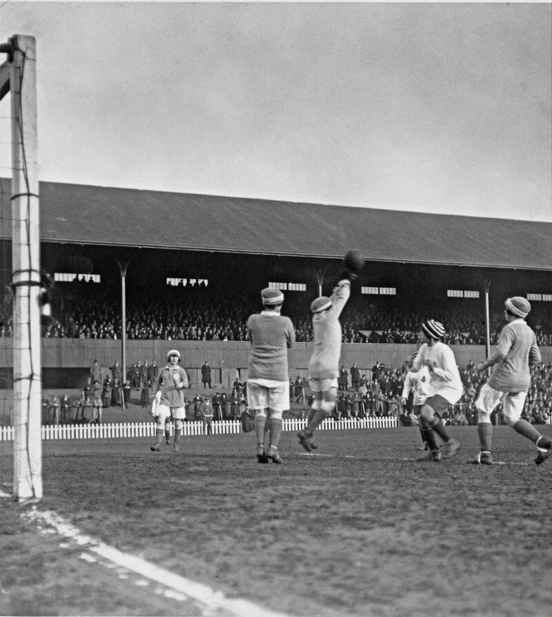Unspecified players as a Scottish XI play Dick, Kerr Ladies, during a fundraising match in aid of former servicemen, held at Tynecastle in Edinburgh on, 2nd March 1921. Photograph: Hulton Archive/Getty Images