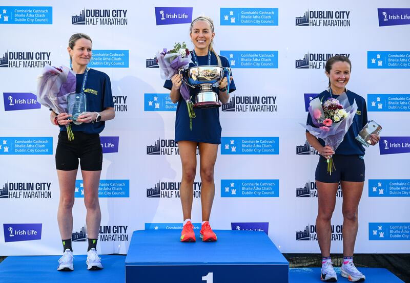 Women's race winner Nichola Sheridan, with second placed Noreen Brouder (left) and third placed Edel Gaffney. Photograph: Ramsey Cardy/Sportsfile