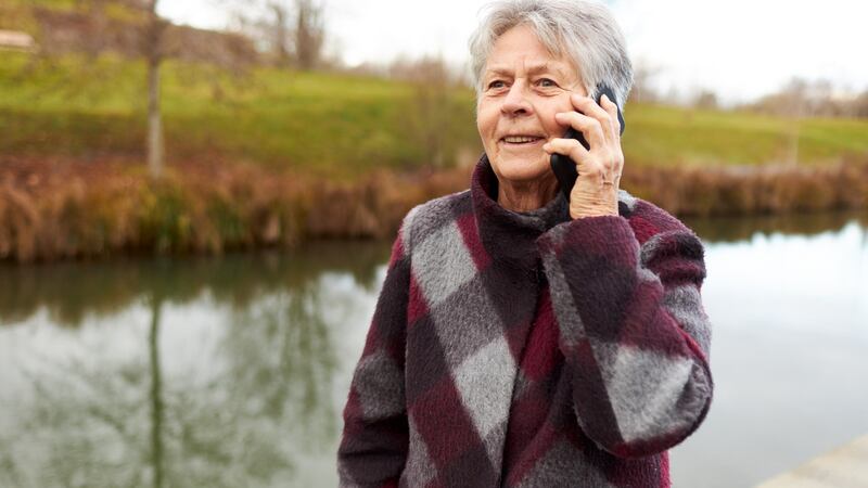 Chatting on the phone is a great way to brighten up your walk. Photograph: iStock