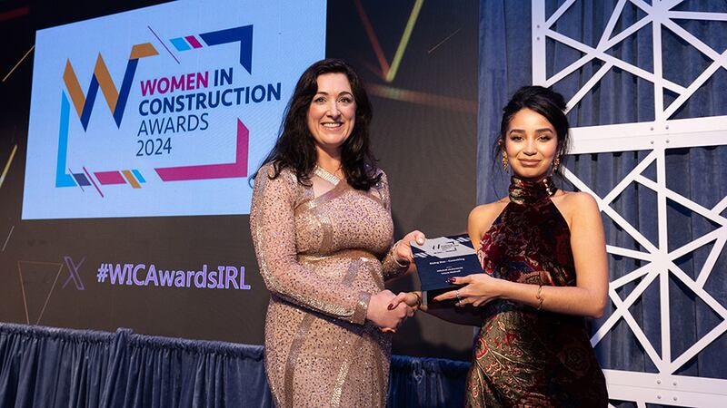 Karen O'Hara, head of sales and marketing, Ardmac, presents the rising star - consulting award to Imane Hachadi, Mitchell McDermott