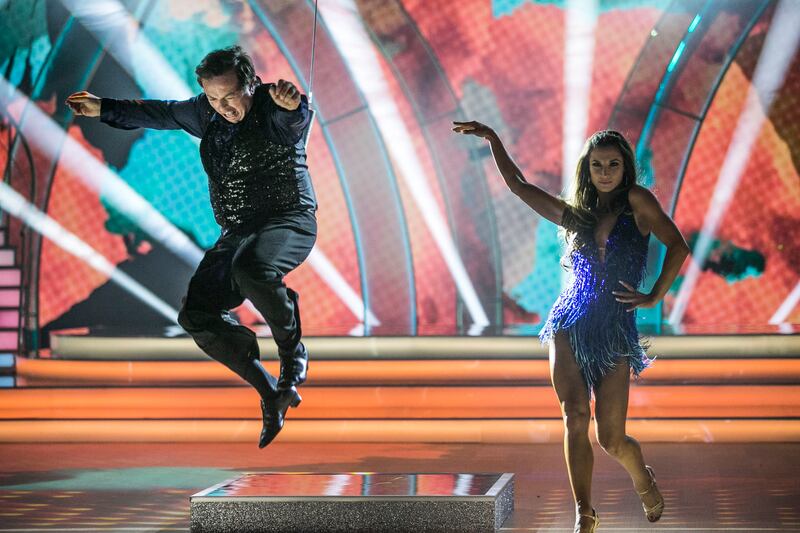 Marty Morrissey leaps in the air during the cha cha with   Ksenia Zsikhotska. Photograph: Kyran O’Brien