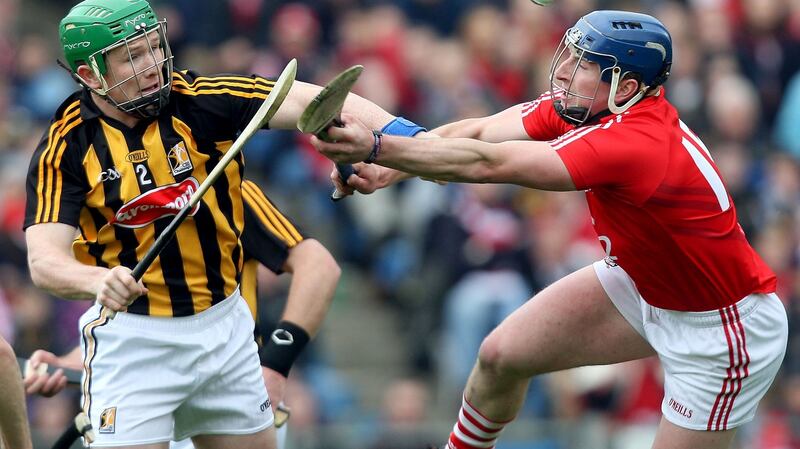 Kilkenny’s Paul Murphy and Patrick Hogan of Cork clash in the 2012 league final. Photograph:  Ryan Byrne/Inpho