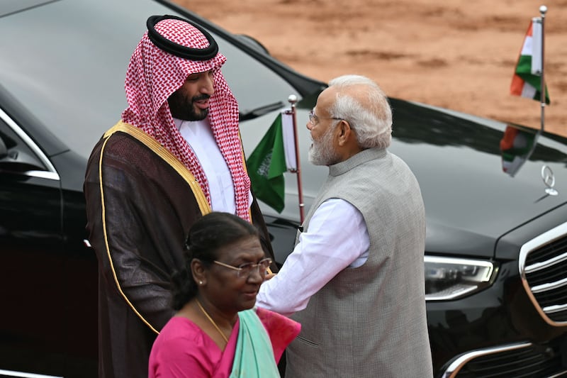 Indian president Droupadi Murmu walks past India's prime minister Narendra Modi greeting his Saudi Arabian counterpart and crown prince Mohammed bin Salman a day after the G20 summit in New Delhi on September 11th. Photograph: Money Sharma/AFP