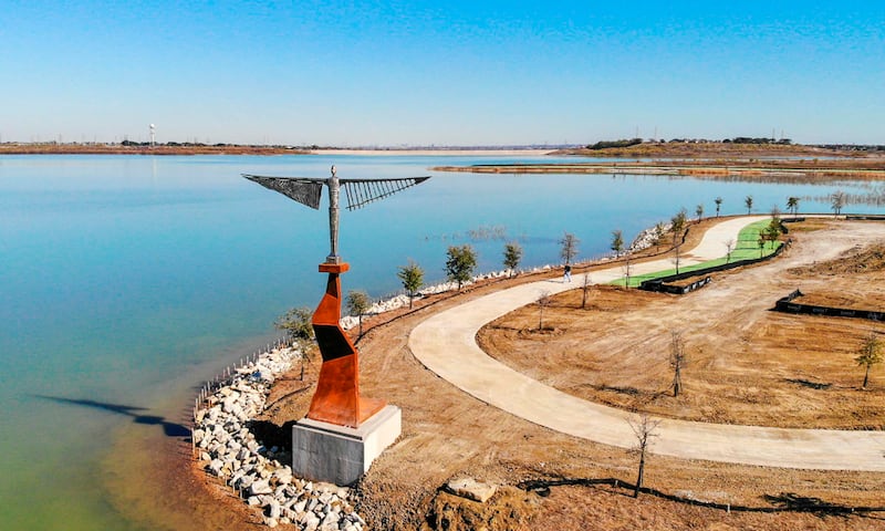 Ronan Halpin's Icarus now stands on the side of an artificial lake in sun-scorched Texas